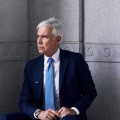 Why are some people opposed to allowing lawyers to advertise?